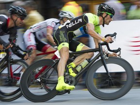 Ricers make a turn in the pro men's 50 lap 60-km cycle race at the Gastown Grand Prix, Vancouver, July 10 2013.
Gerry Kahrmann / PNG