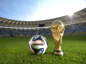 A general view of Brazuca and the FIFA World Cup Trophy at the Maracana in Rio de Janeiro, Brazil.
Photo by Alexandre Loureiro/Getty Images for adidas