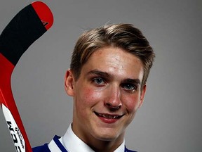 It's official: top pick Jake Virtanen is (now) signed, sealed and delivered as a Vancouver Canuck. (Jeff Zelevansky, Getty Images)