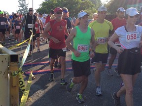 Runners taking part in Sunday's Fort Langley Half Marathon leave the starting line at 7:30 a.m.