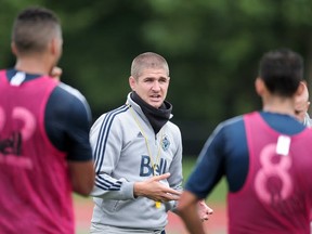 Vancouver Whitecaps' head coach Carl Robinson in action during training in Vancouver, BC., August 14, 2014.
