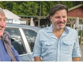 Francesco Aquilini, right and his father Luigi Aquilini.   Ric Ernst, VANCOUVER SUN