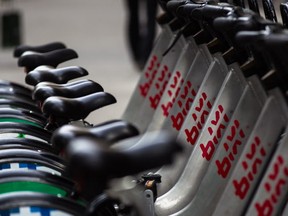Bixi bicycles on a rack on de Maisonneuve boulevard in Montreal on Tuesday, August 12, 2014.