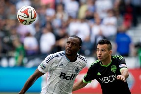 Nigel Reo-Coker, left, battles Seattle Sounders' Marco Pappa for the ball during a game at BC Place this season.