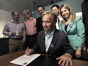 VANCOUVER, BC., August 14, 2014 -- NPA Mayoralty candidate  Kirk LaPointe talks to media as he unveils the party's Code of Conduct in Vancouver, BC., August 14, 2014.