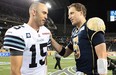 Quarterbacks Ricky Ray (left) and Drew Willy meet after the last time the Toronto Argonauts and Winnipeg Blue Bombers faced each other, a 45-21 Bombers victory on June 26 in Winnipeg. (Marianne Helm, Getty Images)