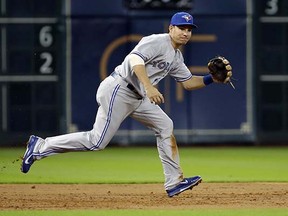 The Toronto Blue Jays added third baseman Danny Valencia (above) three days before the trade deadline supposedly for some offensive impact from the right side of the plate, but in fact he comes at a modest cost and the outgoing salaries of Erik Kratz and Liam Hendricks more than match. (David J. Phillip, Associated Press)