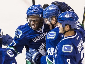 The Vancouver Canucks celebrate a goal by Jordan Subban against San Jose Sharks at Rogers Arena on Tuesday.