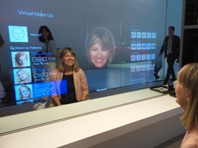 Getting makeup and skin care advice from a mirror in Panasonic's home space of the future at IFA 2014