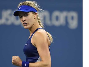 Eugenie Bouchard of Canada reacts to a winning point against Sorana Cirstea of Romania during their U.S. Open women's singles match at the USTA Billie Jean King National Center in New York on Aug. 28, 2014. (Don Emmert, AFP/Getty Images)
