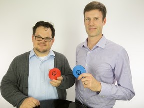 Trent Shumay (left) and Graham Cunliffe, of IoT Design Shop with Signul beacons.