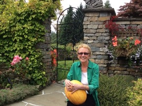 June Macdonald outside her garden in British Properties