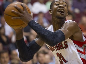 Toronto Raptors Terrence Ross gains possession of the ball against the Sacramento Kings during the first half of a pre-season NBA game at Roger Arena in Vancouver on Oct. 5.