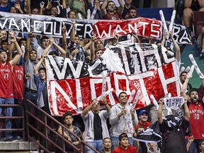 Vancouver fans take in the Toronto Raptors-Sacramento Kings NBA pre-season game at Rogers Arena on Sunday, Oct. 5, 2014. (Ric Ernst, PNG)