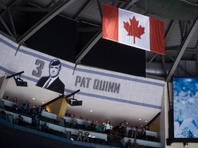 Former Vancouver Canucks' president and general manager Pat Quinn's name and photo are displayed at Rogers Arena after he was inducted into the team's Ring of Honour  on April 13, 2014.