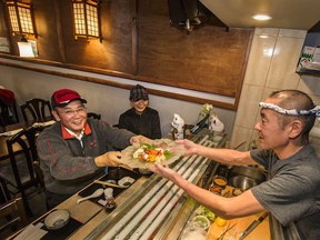 Kazuhisa Tanimoto prepares dishes at Kazu Japanese