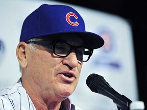 The Chicago Cubs introduce new manager Joe Maddon at Wrigley Field in Chicago on Monday. (David Banks, Getty Images)