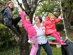 Alexandra Greenhill and her three daughters in their back yard. She has launched her startup called mybesthelper.com which matches people looking for top notch child care.