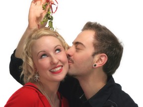 Kissing under the mistletoe is still a popular Christmas tradition.