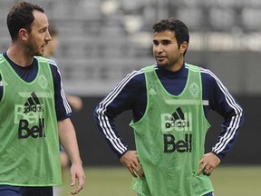 Should he stay or should he go? The Whitecaps aren't likely to protect Andy O'Brien (left) in next week's MLS expansion draft, as opposed to Steven Beitashour (right). (Jason Payne, PNG files)