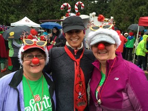 Some 375 runners, many with fun costumes and bright noses, took part in Saturday's seventh annual Santa Shuffle in Abbotsford. More than $17,100 was raised by the event, which ignored the rain and cold to have a fun time.