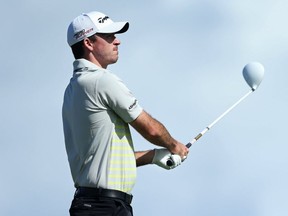 Nick Taylor plays his shot from the 14th tee during Round 1 of the Hyundai Tournament of Champions on the Plantation Course at Kapalua Golf Club