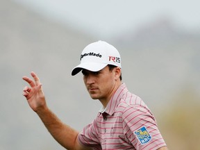 Nick Taylor waves to the gallery on the 15th hole during the first round of the Waste Management Phoenix Open at TPC Scottsdale on Thursday in Scottsdale, Arizona.