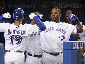 Jose Bautista and Edwin Encarnacion will again be expected to carry the offence this coming season for the Toronto Blue Jays. (Abelimages, Getty Images files)