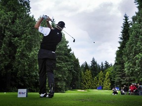 Ernie Els of South Africa tees off at the 2011 Canadian Open at Shaughnessy Golf and Country Club.