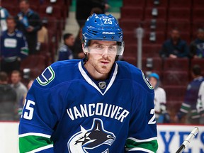 Bobby Sanguinetti of the Vancouver Canucks skates up ice during their NHL game against the Arizona Coyotes at Rogers Arena November 14, 2014 in Vancouver, British Columbia, Canada. (Photo by Jeff Vinnick/NHLI via Getty Images)