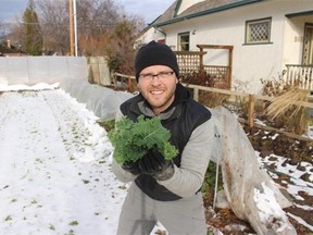 Curtis Stone with some fresh kale at one of his Kelowna urban farming operations. Stone is an expert at farming profitably on small parcels of land.