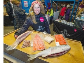 Sonia Strobel displays frozen salmon tuna, salmon and cod fish that is available through Skipper Otto’s CSA program.