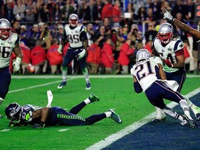Malcolm Butler of the New England Patriots intercepts a pass by Russell Wilson (not pictured) of the Seattle Seahawks late in the fourth quarter of Super Bowl XLIX at University of Phoenix Stadium in Glendale, Ariz., on Sunday. (Rob Carr, Getty Images)