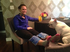 Amy uses ice packs and her dog, Mac, to recover from an intense InTraining session