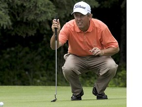 Jim Rutledge sizes up a shot during the 2009 Telus Edmonton Open. (Walter Tychnowicz, Postmedia News files)