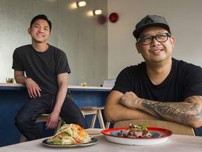 Kin Kao's Terrence Feng   and Tang Phoonchai  with some of their dishes