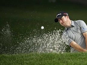 Nick Taylor hits out of a sand trap on the 11th hole during the first round of the Valspar Championship golf tournament on Thursday in Palm Harbor, Fla. (Chris O'Meara, Associated Press)