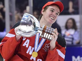 You could be forgiven for thinking of this fall's Young Stars Classic in Penticton as the Connor McDavid Show. Here the expected No. 1 overall draft pick of the Edmonton Oilers hoists the world junior hockey championship trophy for Team Canada last January. (Frank Gunn, Canadian Press)