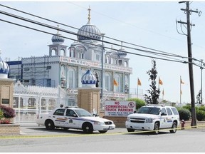 Police outside Richmond temple where man was murdered June 5, 2015