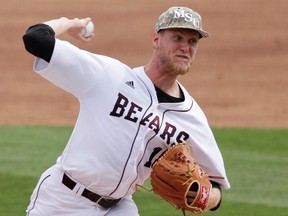 Missouri State pitcher Jon Harris throws against Arkansas during the second inning in a super regional of the NCAA college baseball tournament in Fayetteville, Ark., on June 5, 2015.