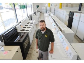 Matt Little recycles appliances and rebuilds the better models by cannibalizing parts from similar models at B-Line Appliance in Vancouver.
Photograph by: Arlen Redekop, Vancouver Sun