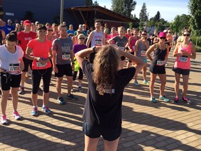 MEC Langley Race Director Kathie Schellenberg gives the 10K racers last-minute instructions on Sunday before they took part in the first Trans Canada Trail Run at Fort Langley. The event also included a marathon, half-marathon and 5K and attracted more than 300 participants.