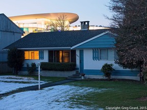 Chinese-themed Aberdeen shopping centre rises above Richmond bungalow. Between 1981 and 2011, the ethnic Chinese population of Richmond grew by 82,000, the South Asian population by 10,000 and Filipinos by 11,000, with the white population dropping by 28,000. Photo: Courtesy Greg Girard and Monte Clark Gallery. www.greggirard.com