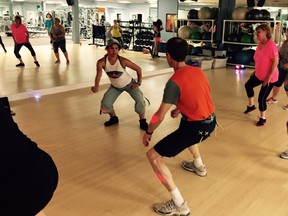 Elena Villacis, the bubbly owner of Fiesta Latina Fitness in Maple Ridge, puts her classmates through a series of fun moves during the special  Man vs. Women Sex Challenge in the Fitwells For Women Gym studios.