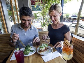 Jess Reno and Ariel Ladret at the table with avacado toast and tomato toast