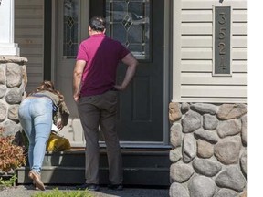 Aman and Satvir Gill leave flowers at the home of Ping Shun Ao, the innocent victim of a drive-by shooting