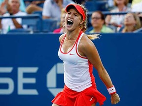 Canada’s Eugenie Bouchard celebrates after defeating Dominika Cibulkova of Slovakia in their third-round ladies singles match at the U.S. Open tennis championship last week. (Al Bello, Getty Images)