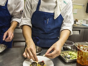 Chef-owner Curtis Luk plates Roasted squash, corn and Peaches Veloute, with heirloom tomatoes and shaved fennel.