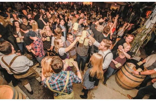 Harvest Haus revellers raise their steins.