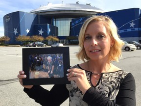 Tania MacKay Dobin, who grew up in North Vancouver and now lives in Langley, hold up the photo of her mother Marie, who died in July of cancer. The unselfish, award-winning Marie MacKay, who on her own time and dime worked with HIV/AIDS patients in Kenya and set up other compassionate programs, was described by Sister Patricia, a Franciscan missionary nun, as "just below Mother Teresa — one of those who bloom when they’re planted.”